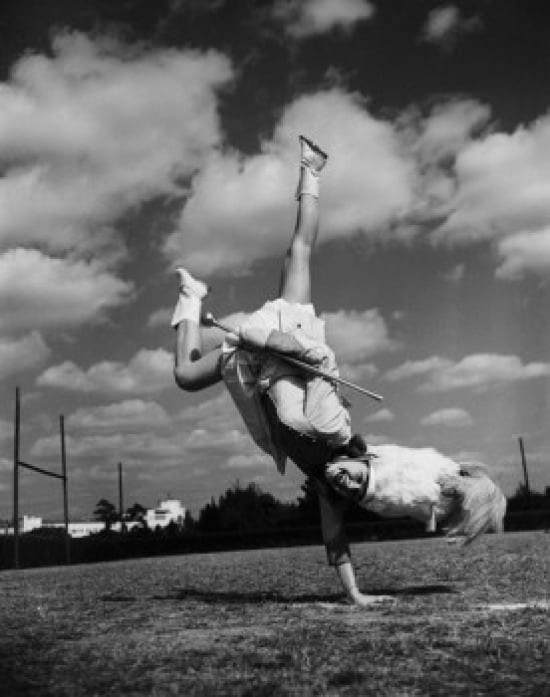Majorette performing and doing handstand Canvas Art - (24 x 36)