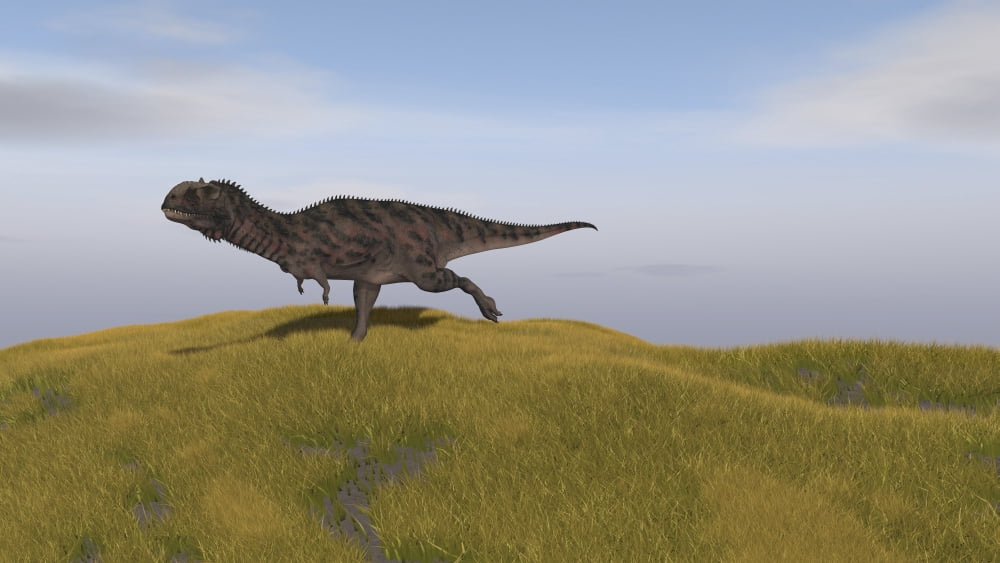 Majungasaurus running across a grassy field Canvas Art - Kostyantyn IvanyshenStocktrek Images (19 x 11)