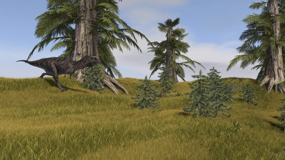 Majungasaurus running across a grassy field Canvas Art - Kostyantyn IvanyshenStocktrek Images (19 x 11)