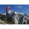 thumbnail image 1 of Male Hiker Standing with Arms Raised in The Air On Top of Mountain Ridge Overlooking Snow Peaked Mountains with Blue Sky Poster Print by Michael Interisano - 36 x 24 - Large, 1 of 1