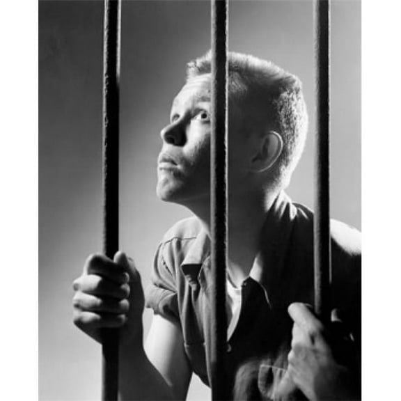 Male Prisoner Holding Prison Bars in a Prison Cell Poster Print - 18 x 24 in.