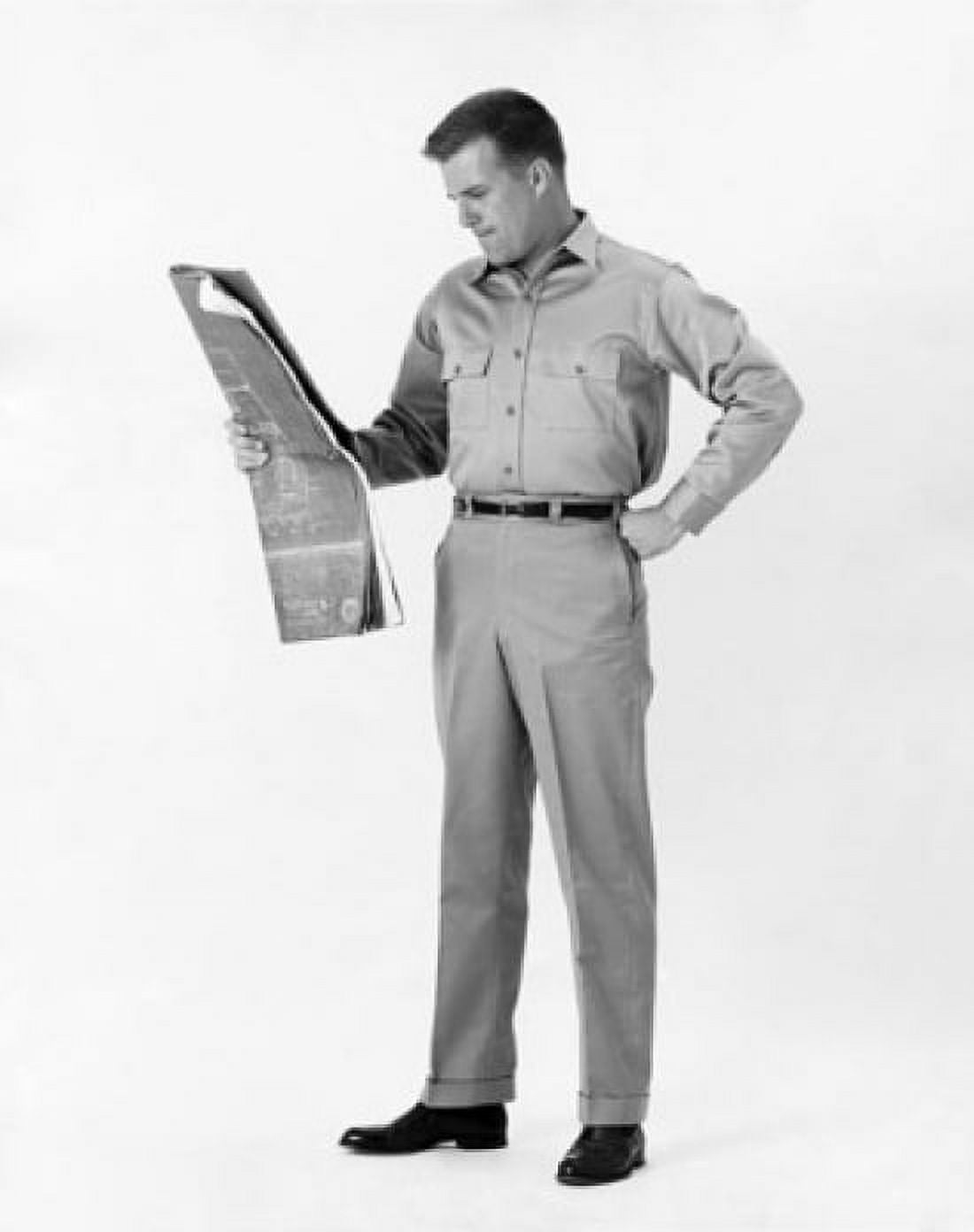 Male architect reading a blueprint Canvas Art -  (18 x 24)