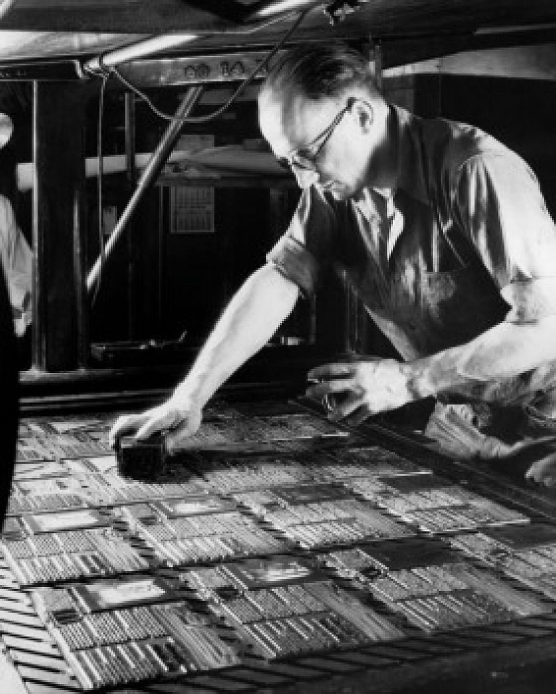 Male employee working in a printing press factory Canvas Art - (18 x 24)