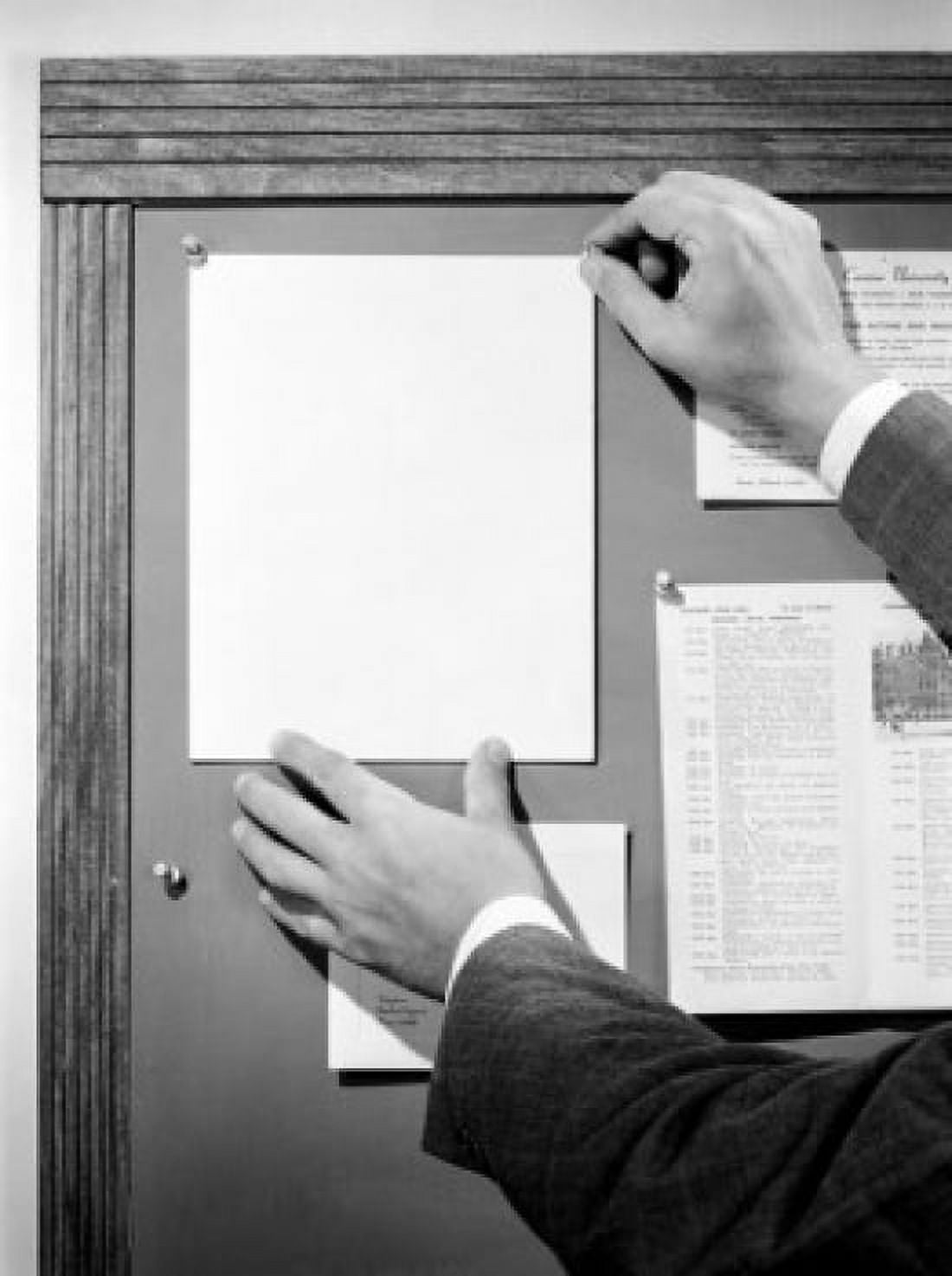 Male hands pinning blank sheet on notice board Canvas Art - (24 x 36)