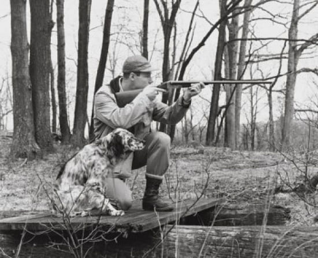 Male hunter aiming with his rifle Canvas Art - (18 x 24)