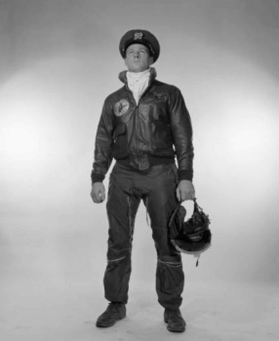 Male pilot holding helmet looking up Canvas Art - (24 x 36)