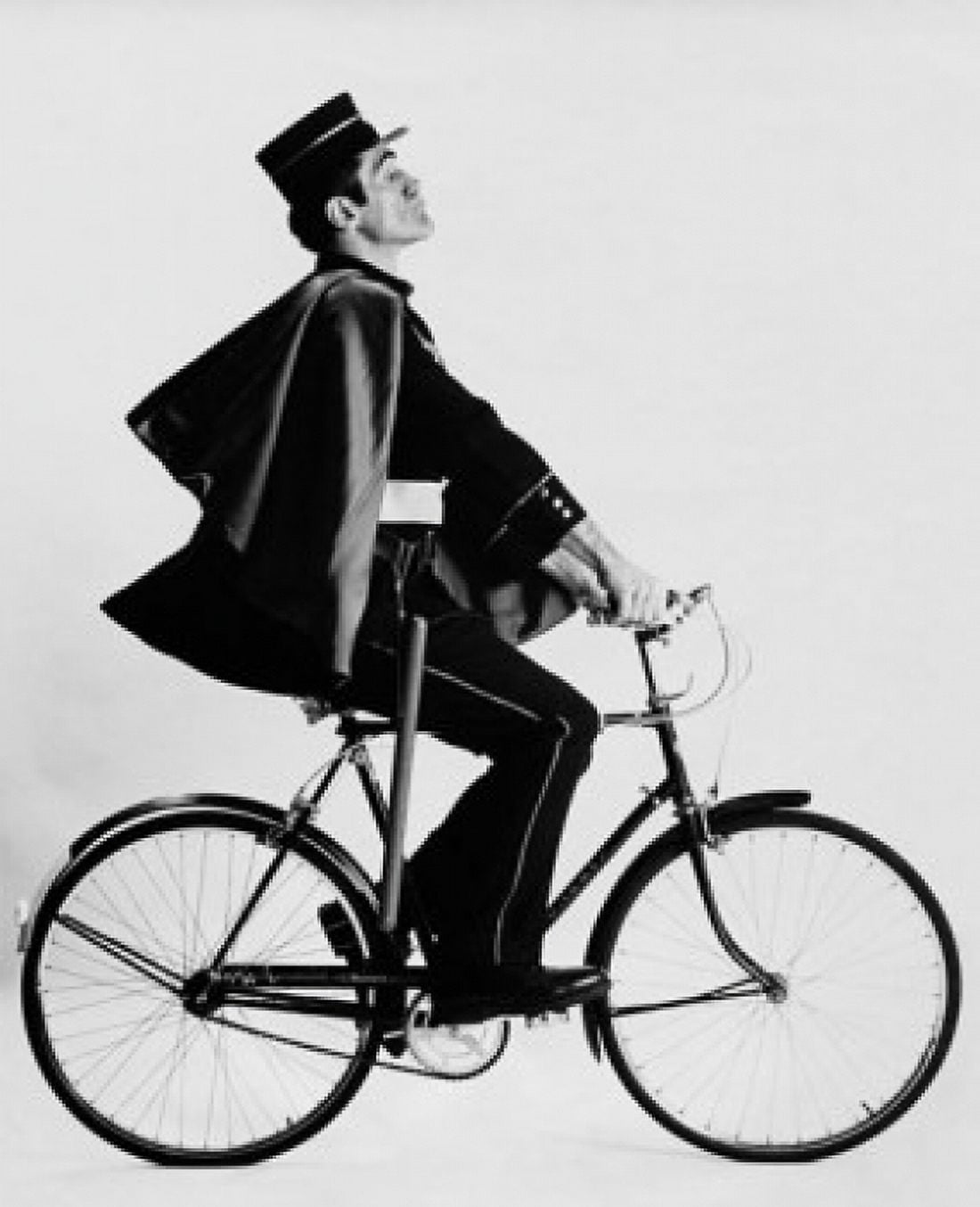 Male policeman riding a bicycle Canvas Art - (18 x 24)