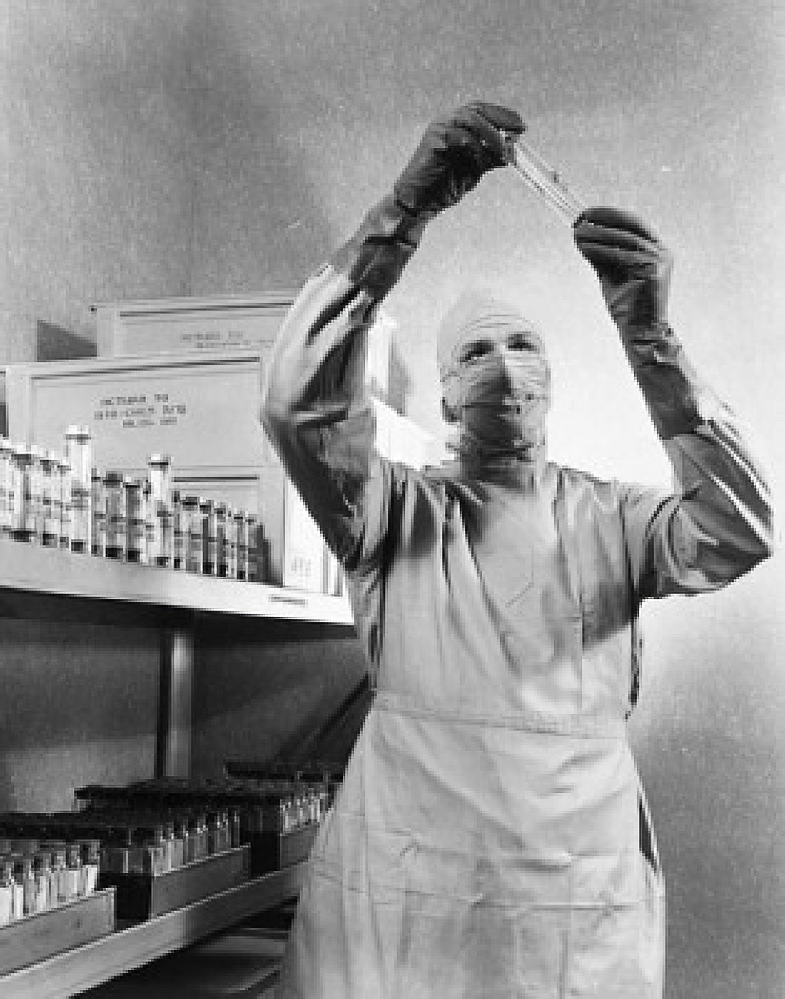 Male scientist examining a test tube Canvas Art - (24 x 36)
