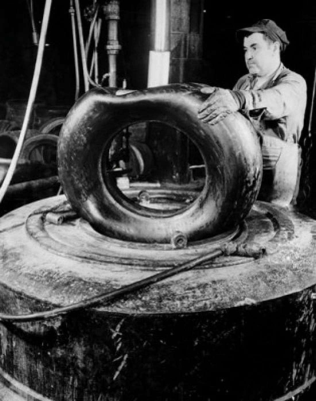 Male worker working in tire factory Canvas Art - (18 x 24)