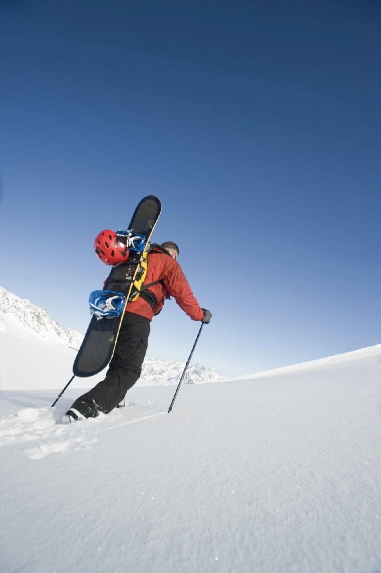 Man Backcountry Snowshoeing While Carrying A Snowboard On Eagle Glacier Chugach Mountains Southcentral Alaska WinterN Canvas Art - Dan Bailey Design Pics (11 x 17)