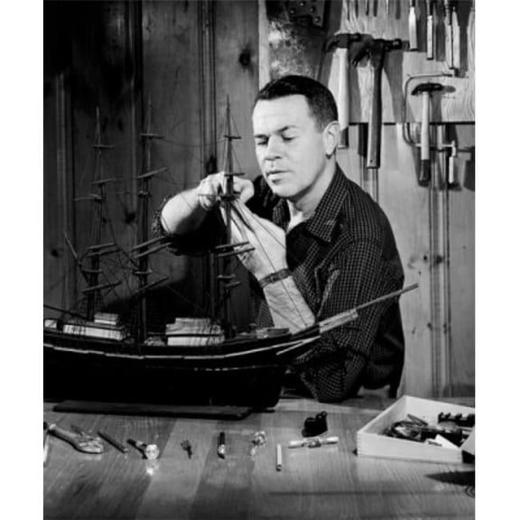 Man Building Model Ship Poster Print - 18 x 24 in.