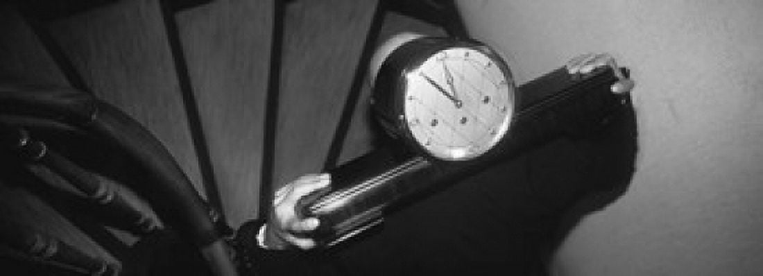Man Carrying Clock Up Stairs On Shoulders Canvas Art - Panoramic Images (18 x 7)