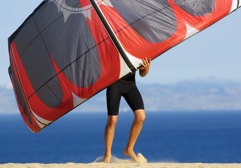 Man Holding Kite For Surfing Costa De La LuzAndalusiaSpain Canvas Art - Ben Welsh Design Pics (34 x 22)