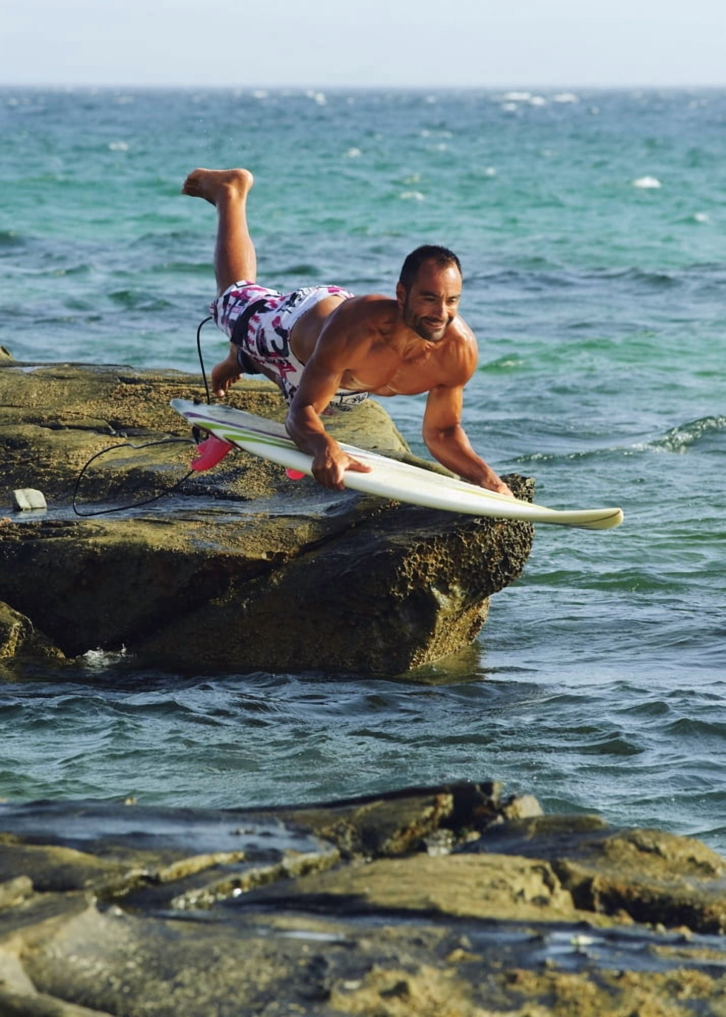 Man Jumping Into The Water On His Surf Board Canvas Art - Ben Welsh Design Pics (13 x 18)