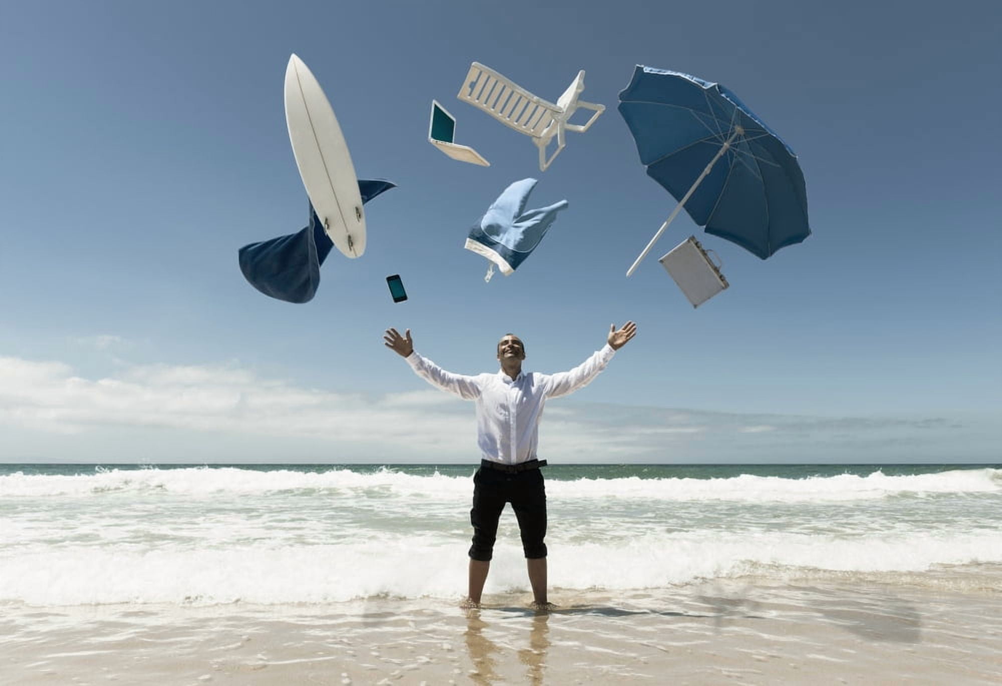 A Man Stands In The Ocean With Items From Work And Vacation Flying Over His Head Tarifa Cadiz Andalusia Spain Canvas Art - Ben Welsh Design Pics (36 x 24)