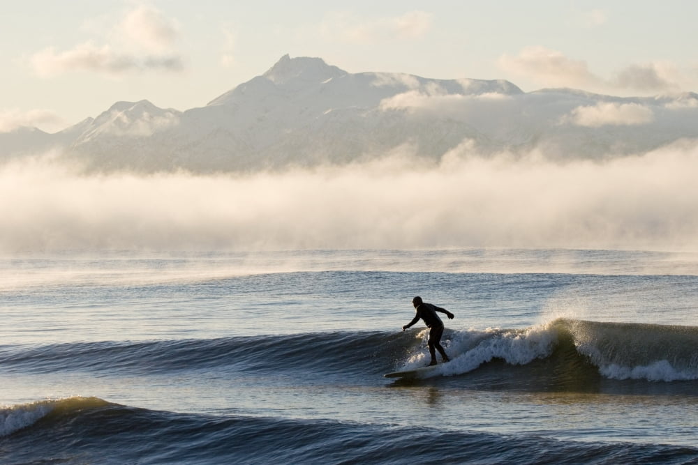 Man Surfing In Moring Near Homer Kachemak Bay WKenai Mountains Kenai Peninsula Alaska Winter Canvas Art - Scott Dickerson Design Pics (17 x 11)