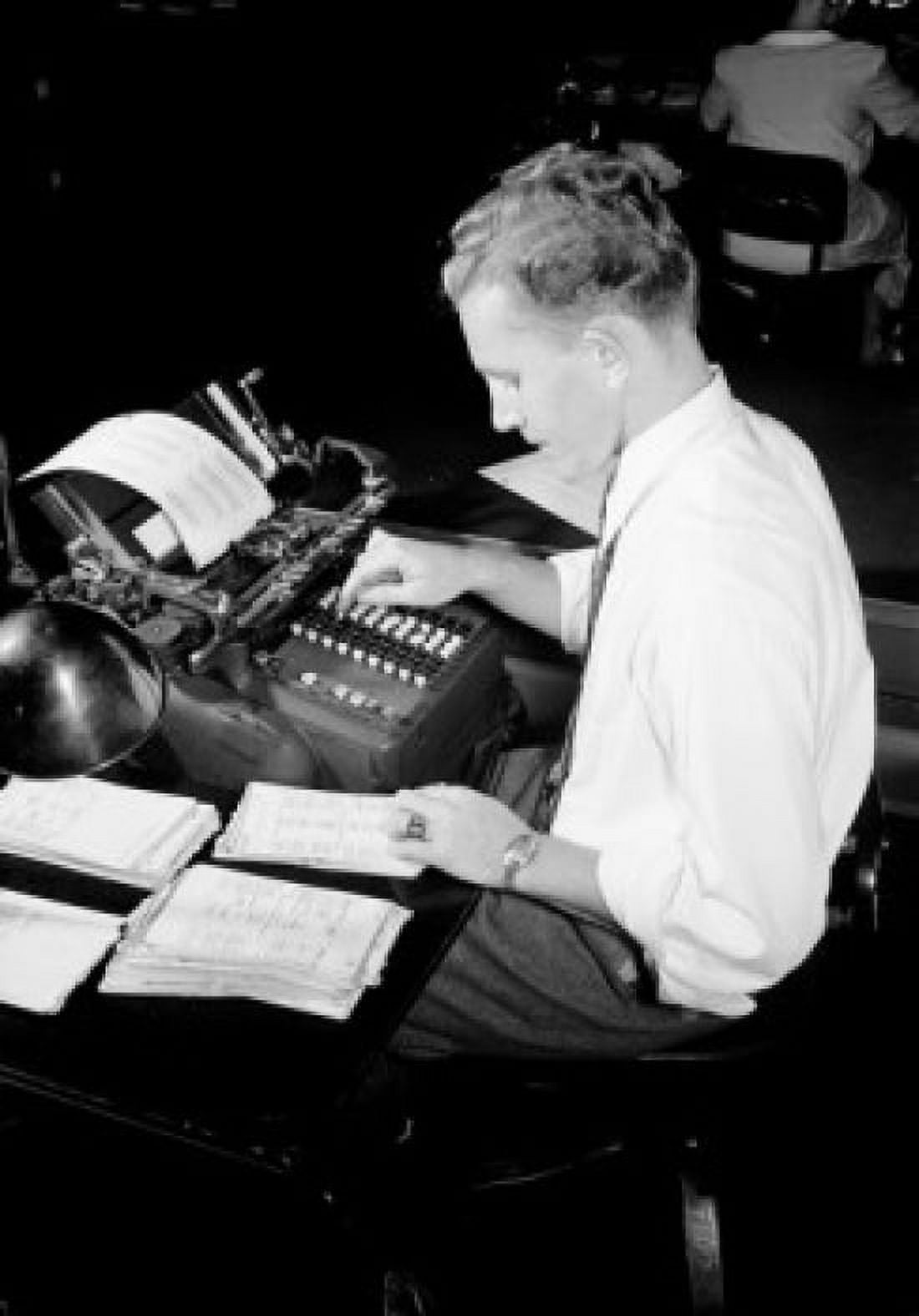 Man doing paperwork using counting machine Canvas Art - (24 x 36)