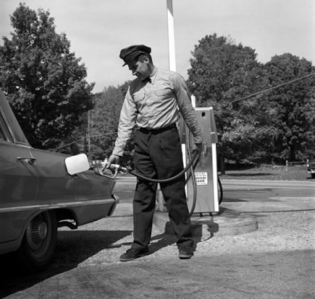 Man filling gas tank in car with patrol Canvas Art - (24 x 36)