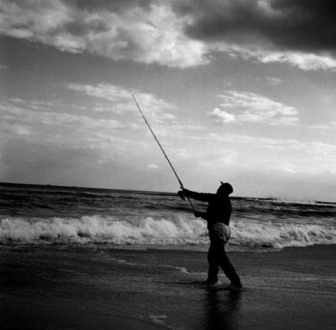 Man fishing at the edge of water Canvas Art - (24 x 36)