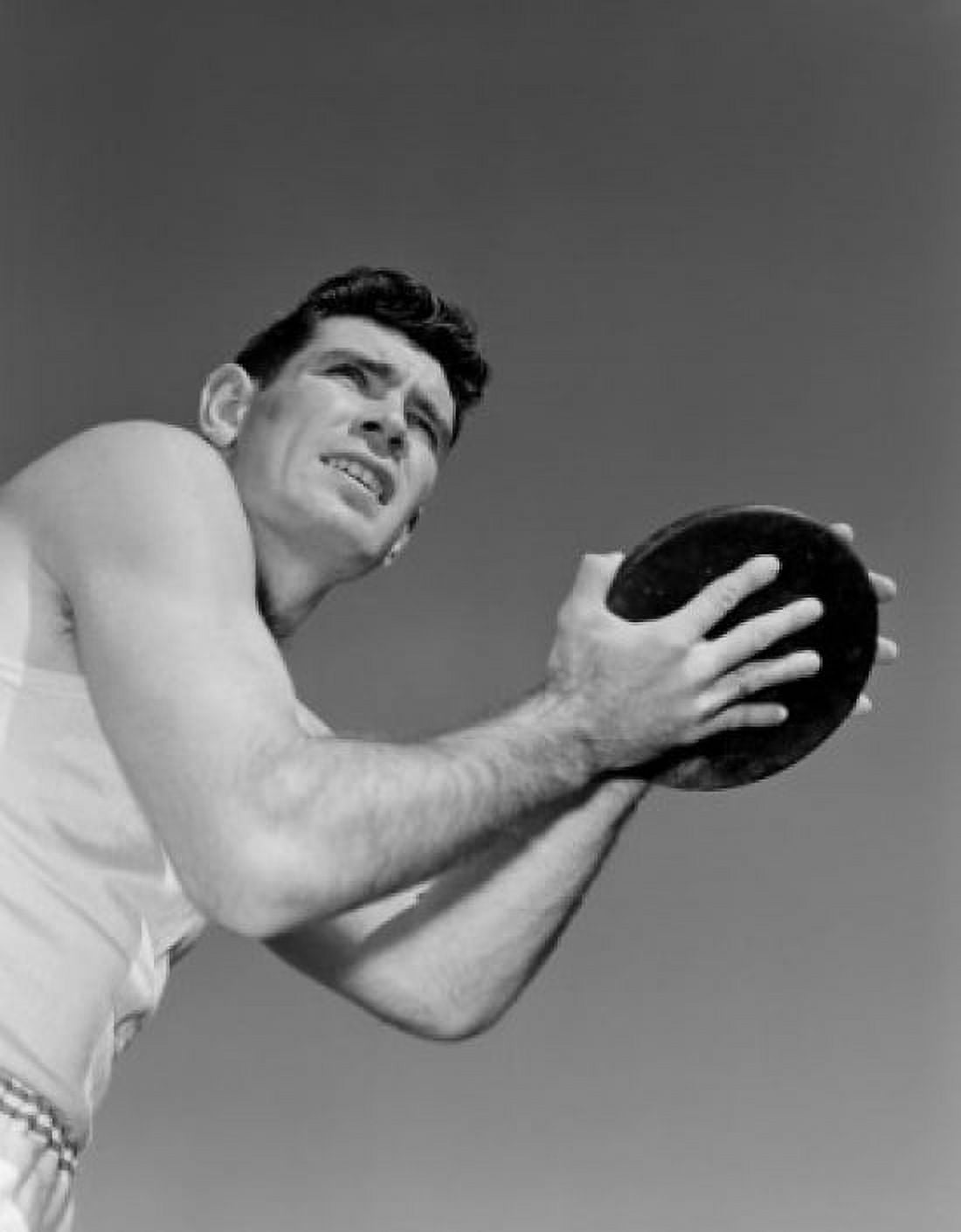 Man holding plastic disc Canvas Art - (18 x 24)