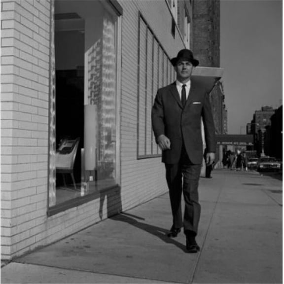 Man in Suit Walking Down Street Poster Print - 18 x 24 in.