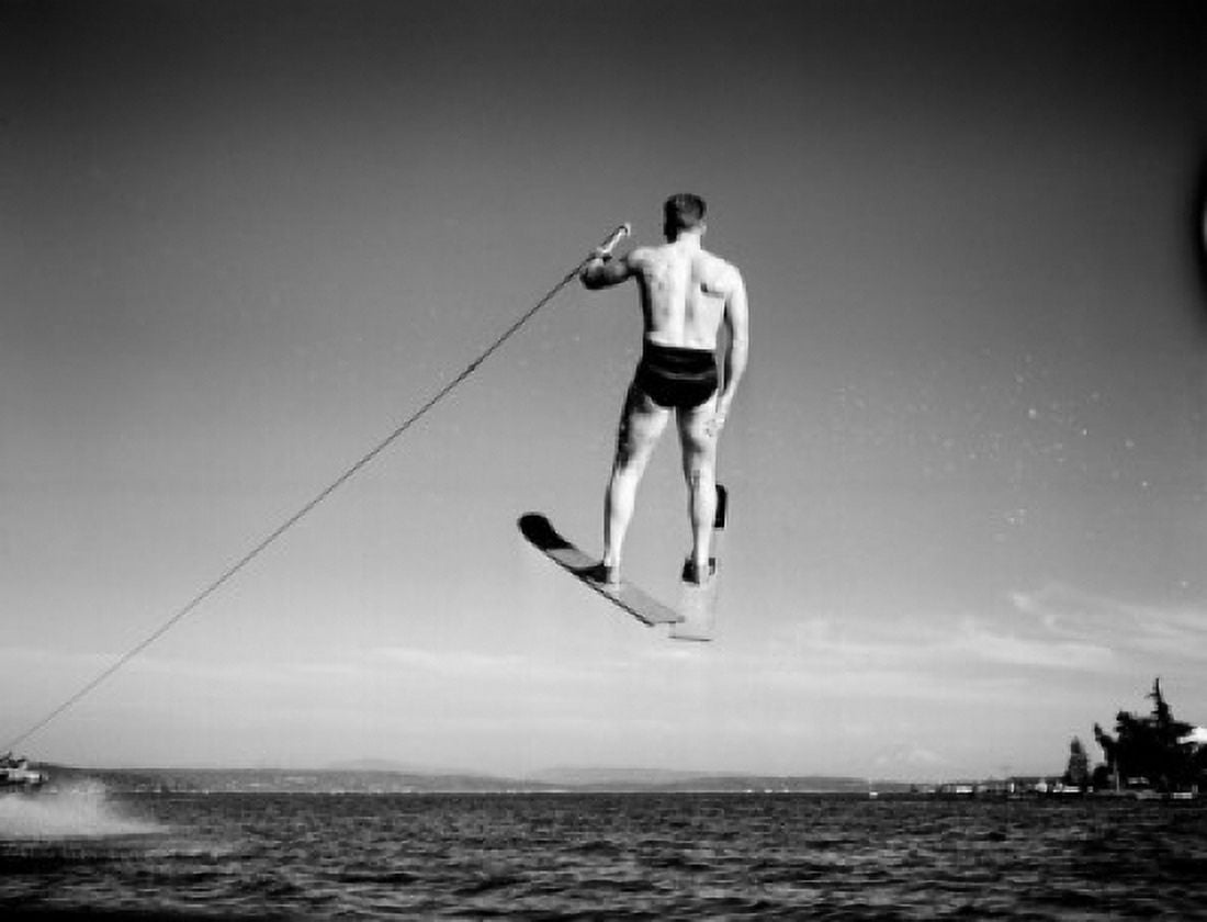 Man in mid air wearing water ski Canvas Art - (24 x 36)