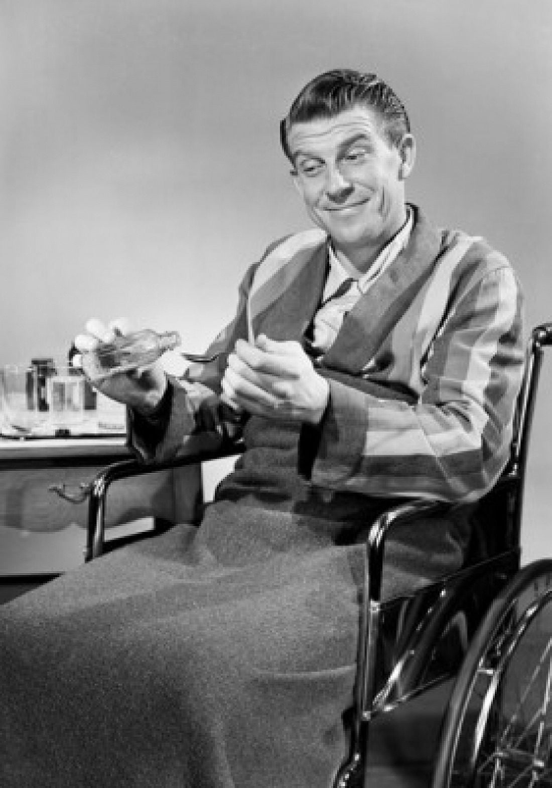 Man in wheelchair taking medicine Canvas Art - (18 x 24)