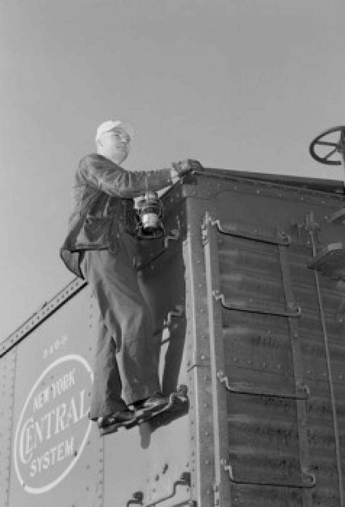 Man inspecting train Canvas Art - (18 x 24)