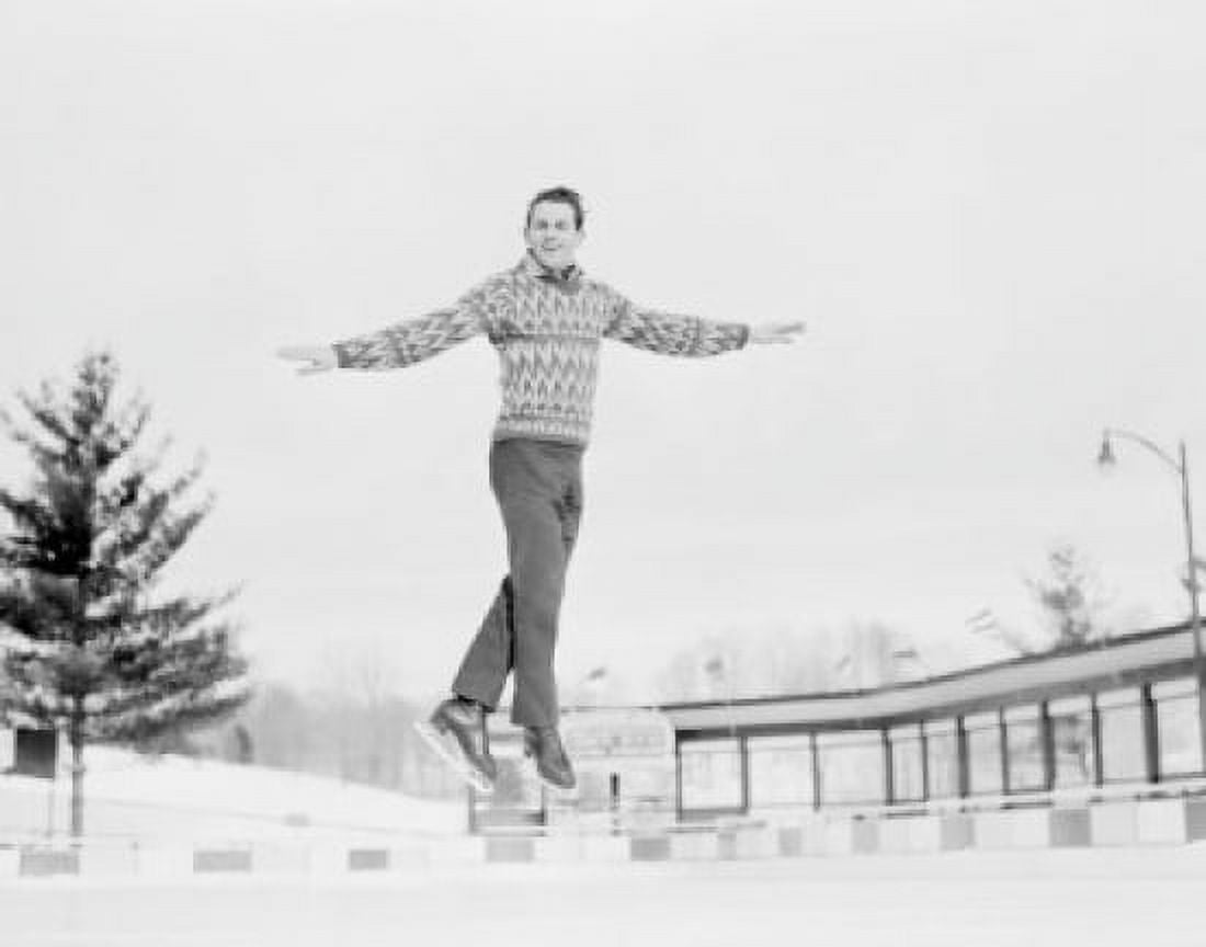 Man jumping while ice skating Canvas Art - (24 x 36)