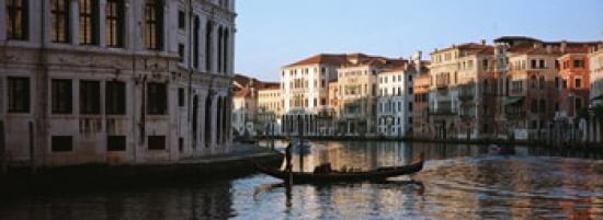 Man on a gondola in a canal Grand Canal Venice Italy Canvas Art - Panoramic Images (36 x 13)