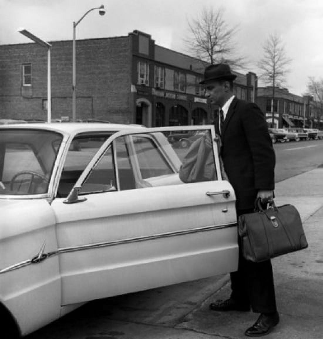 Man opening car on street Canvas Art - (18 x 24)