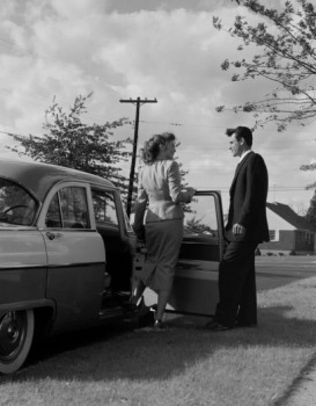 Man opening door and woman boarding into car Canvas Art - (24 x 36)