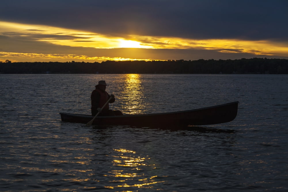 Man paddling canoe at sunrise on Balsam Lake Ontario Canada Canvas Art - Vast Photography Design Pics (36 x 24)