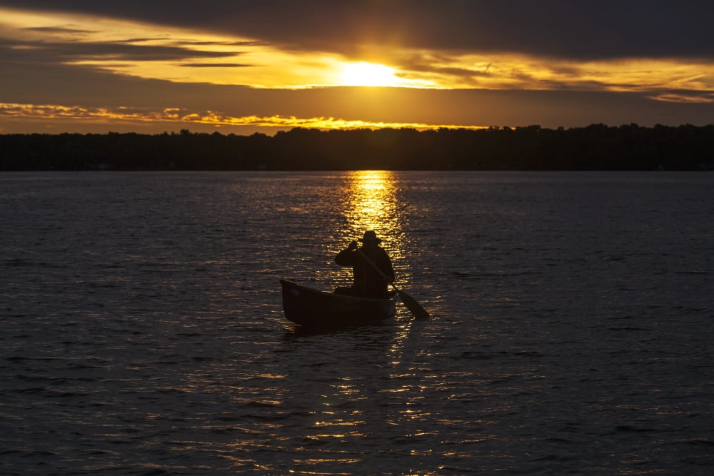Man paddling canoe at sunrise on Balsam Lake Ontario Canada Canvas Art - Vast Photography Design Pics (38 x 24)