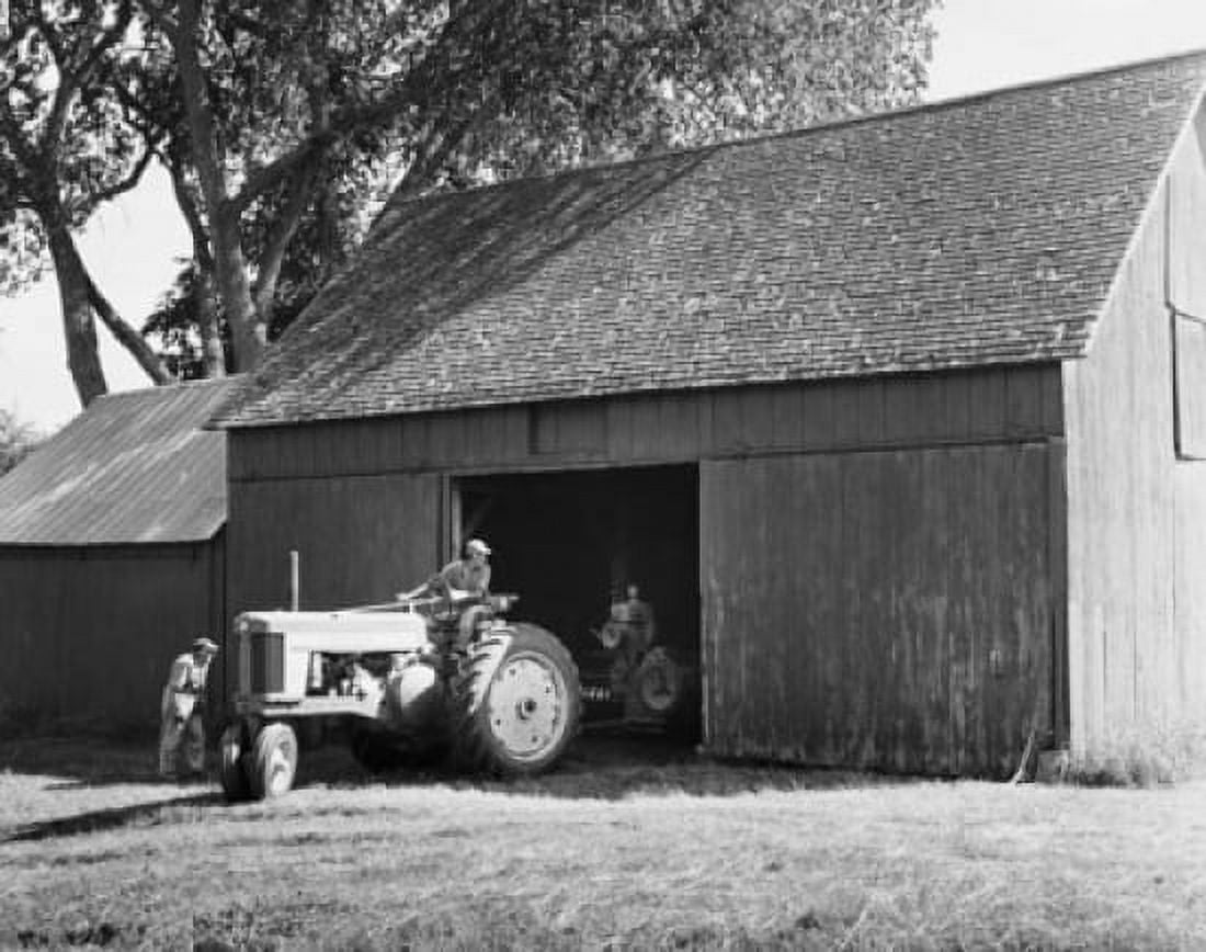Man parking a tractor in a barn Quechee Vermont USA Canvas Art - (24 x 36)