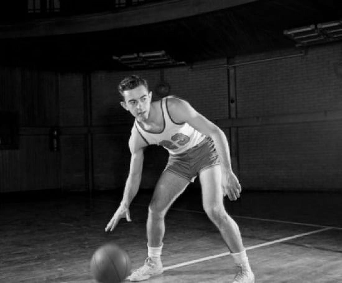 Man playing basketball in gym Canvas Art -  (18 x 24)