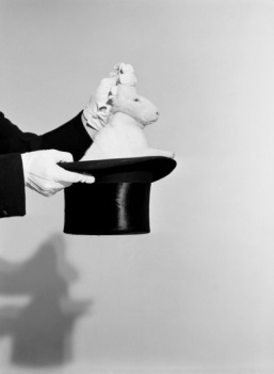 Man pulling rabbit out of hat Canvas Art - (24 x 36)