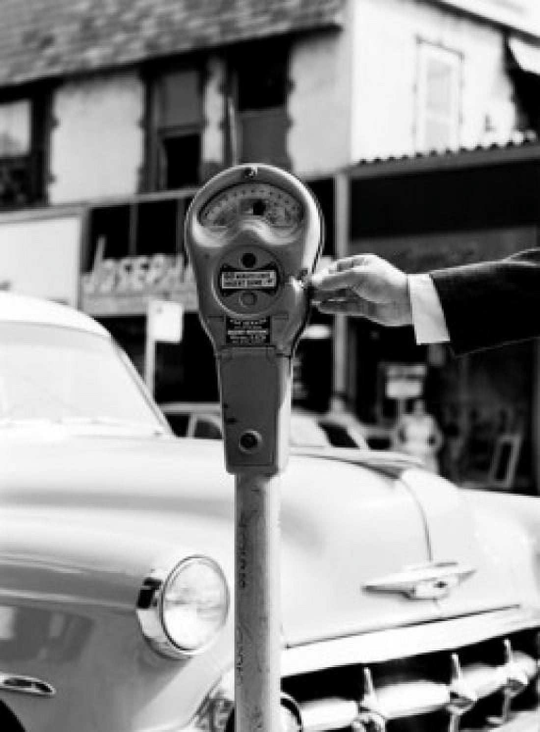 Man putting money into parking meter Canvas Art - (18 x 24)