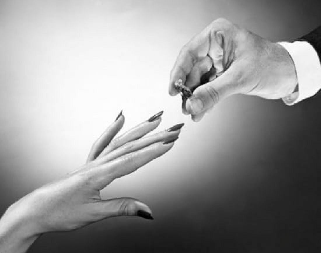 Man putting wedding ring on a womans finger Canvas Art - (18 x 24)