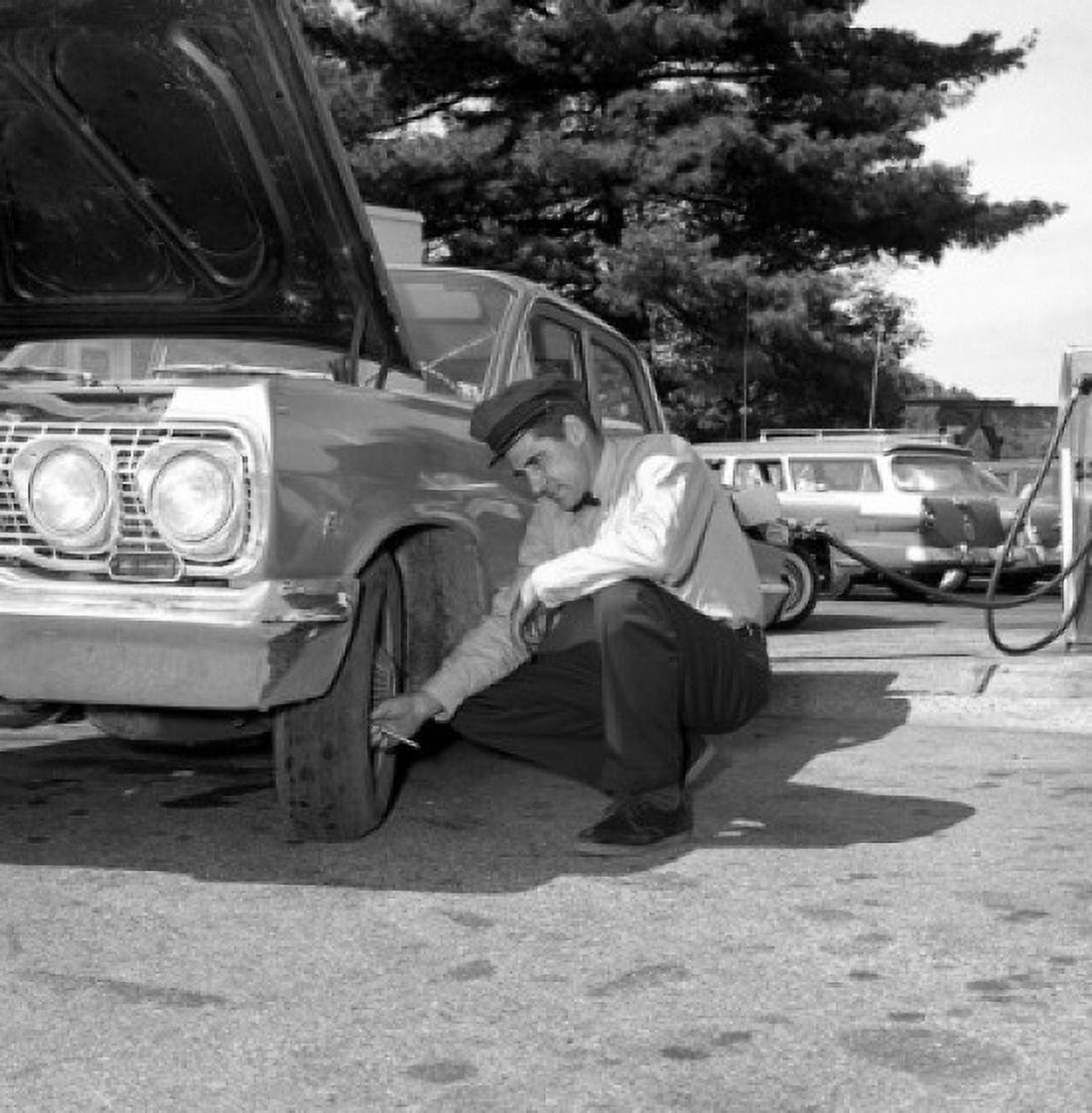 Man repairing car Canvas Art - (24 x 36)