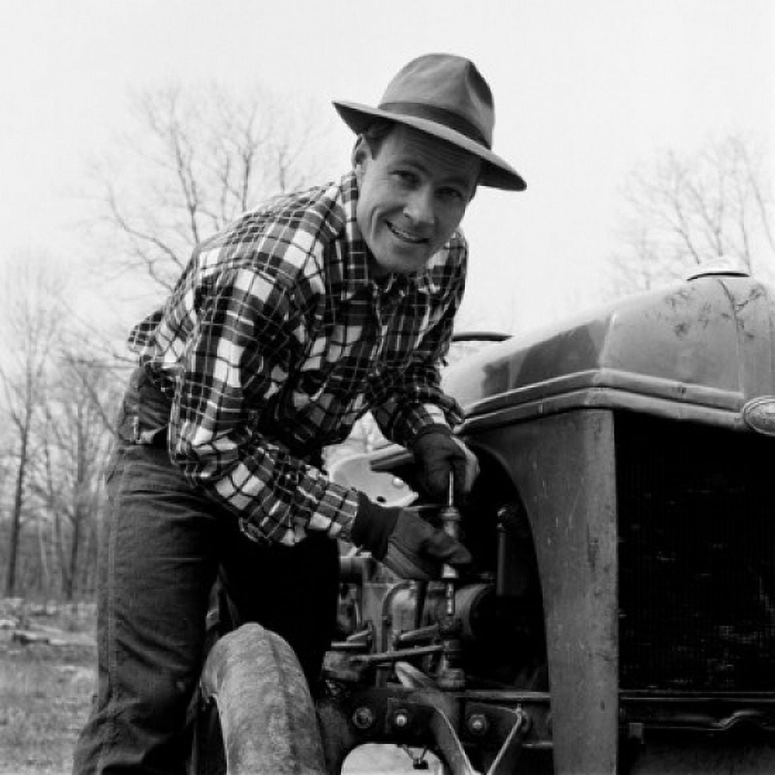 Man repairing tractor Canvas Art - (18 x 24)