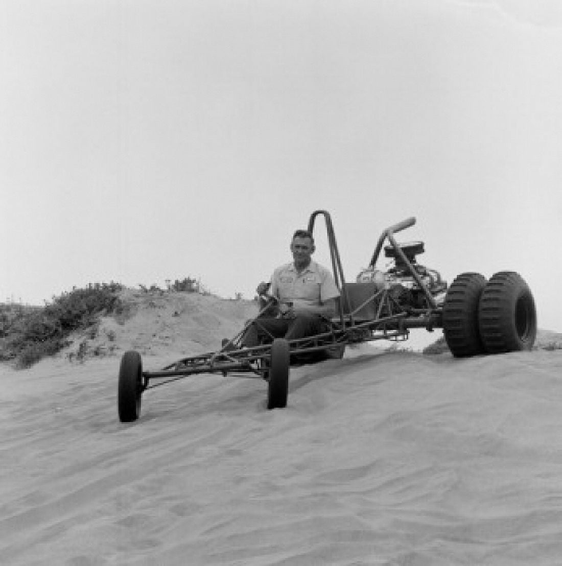 Man riding beach buggy on sand dunes Canvas Art - (18 x 24)