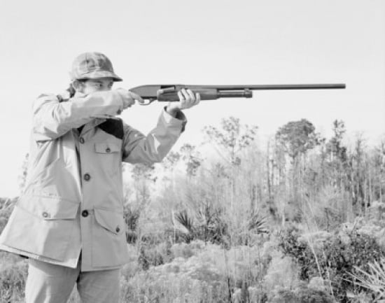 Man shooting rifle Canvas Art - (24 x 36)