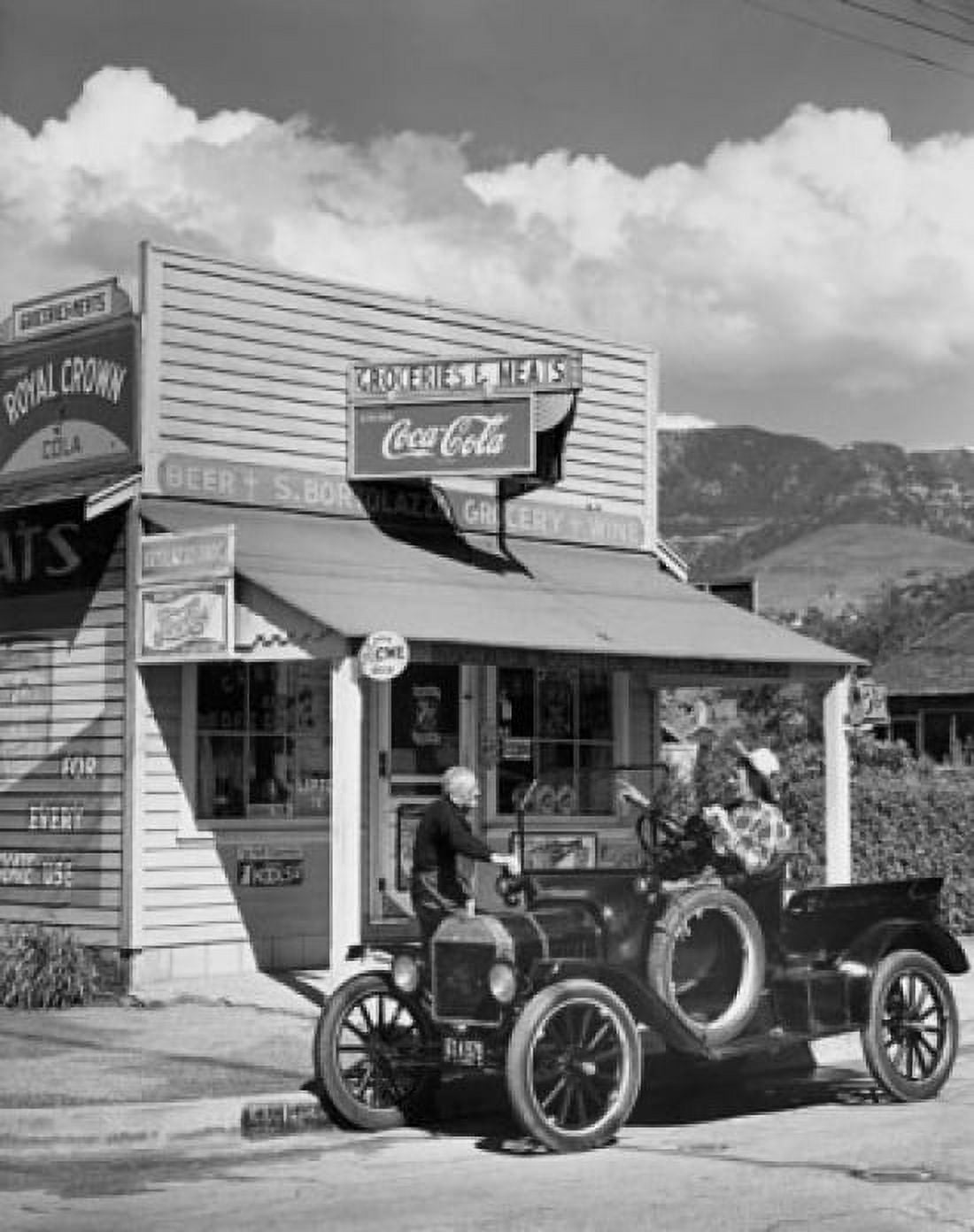 Man sitting in a car in front of a store Canvas Art - (24 x 36)