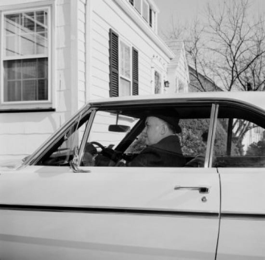 Man sitting in car outside house Canvas Art - (18 x 24)