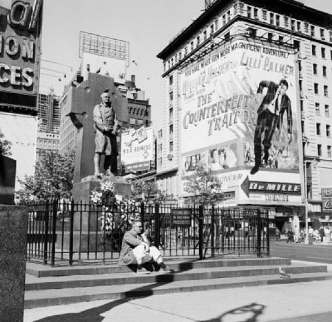 Man sitting in front of a statue Father Duffy Monument Times Square Manhattan New York City New York USA Canvas Art - (18 x 24)