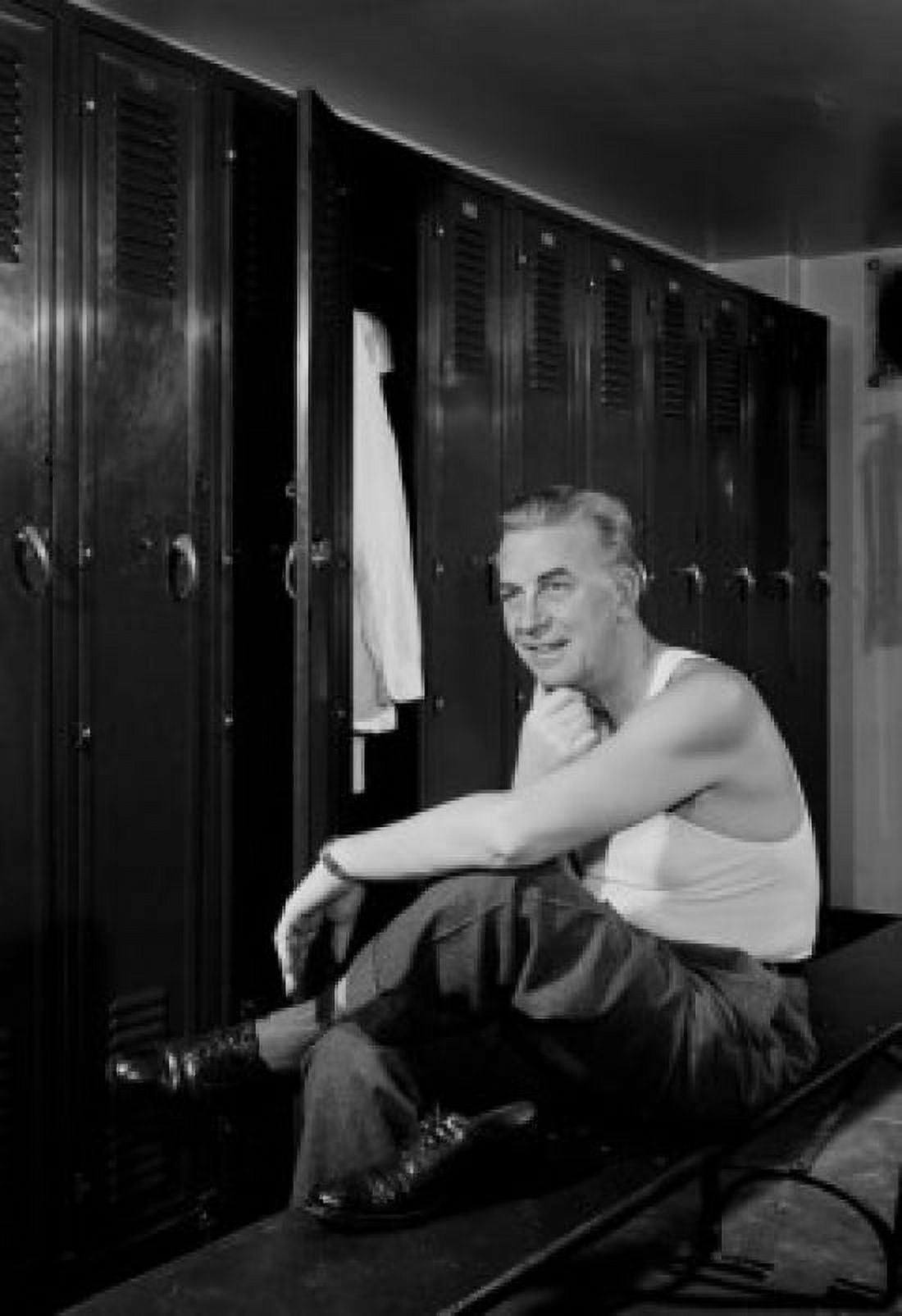 Man sitting in locker room Canvas Art - (18 x 24)