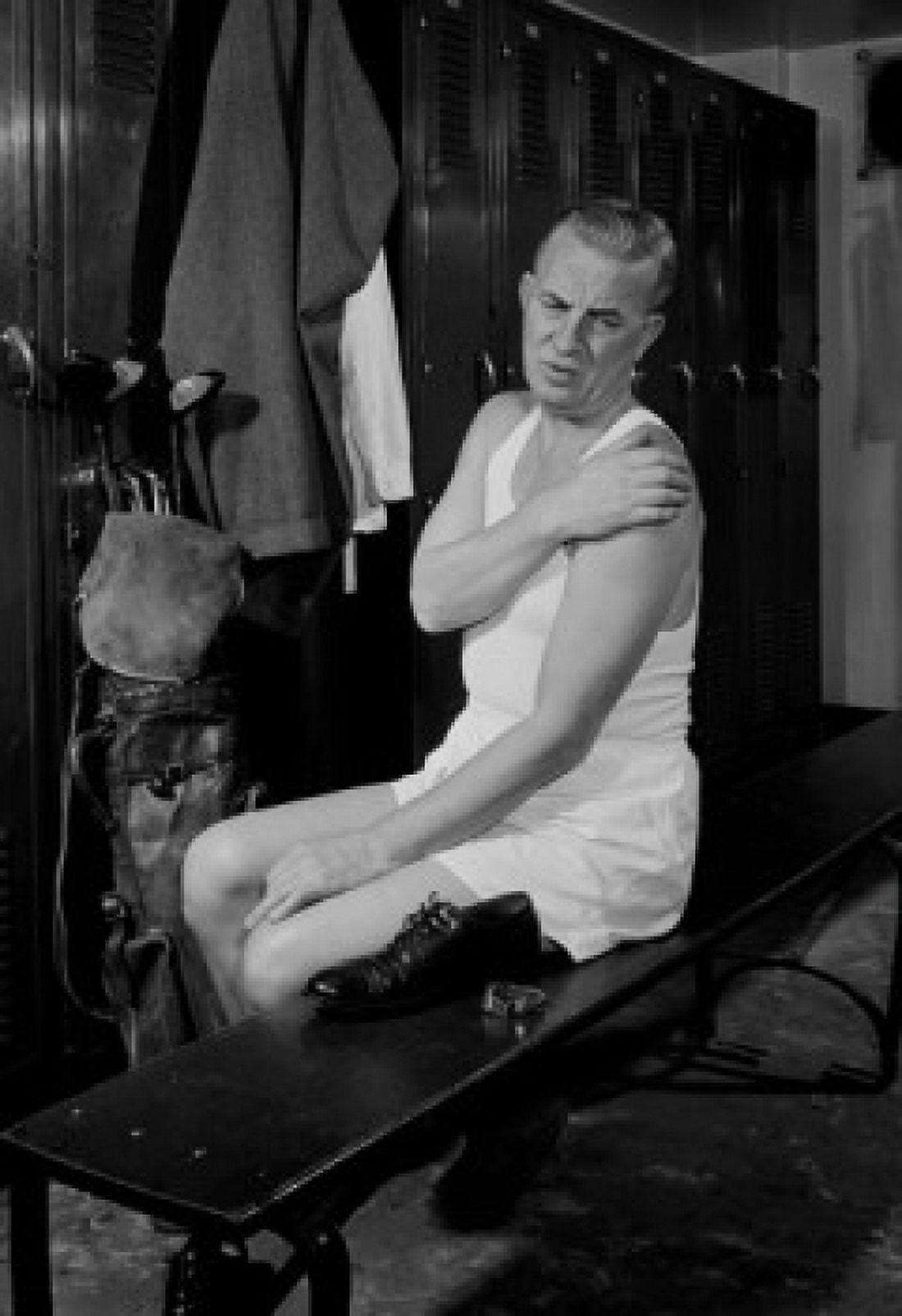 Man sitting in locker room Canvas Art - (18 x 24)