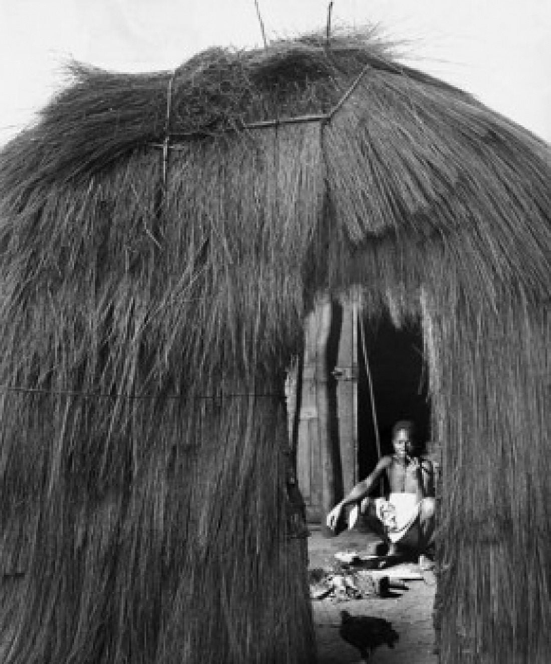 Man squatting in a hut Brazzaville Republic of the Congo Canvas Art - (18 x 24)