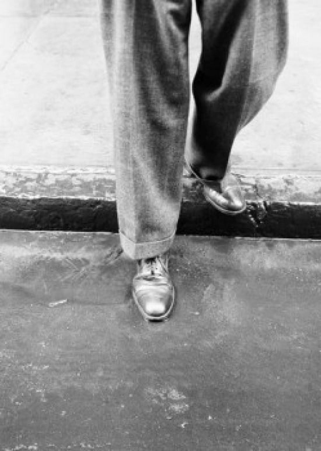 Man standing on pavement in rain low section Canvas Art -  (24 x 36)